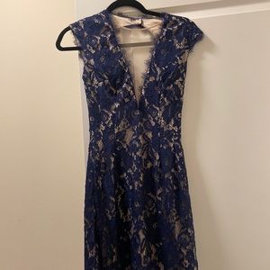Gorgeous open-backed lace blue dres